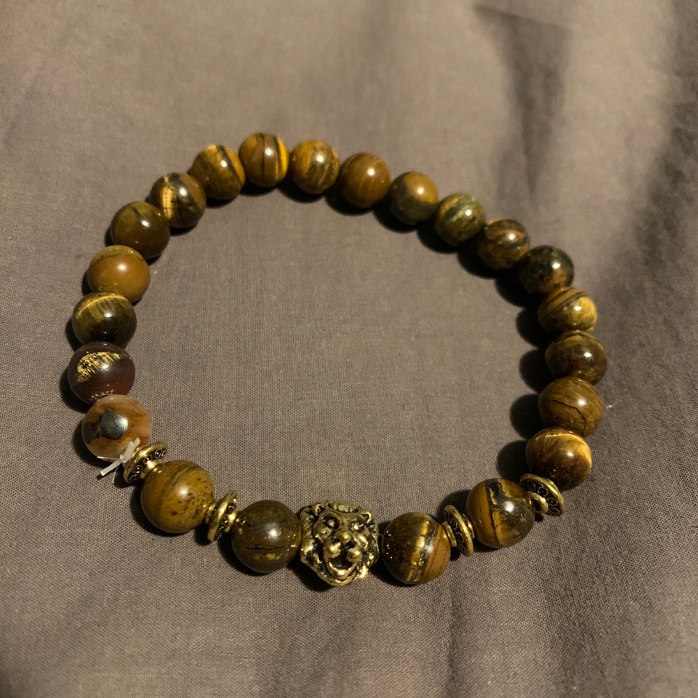 Beaded Bracelet with a Lion head on it